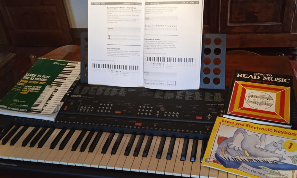 Our Yamaha PSR 400 keyboard and learning materials are available for guests' use